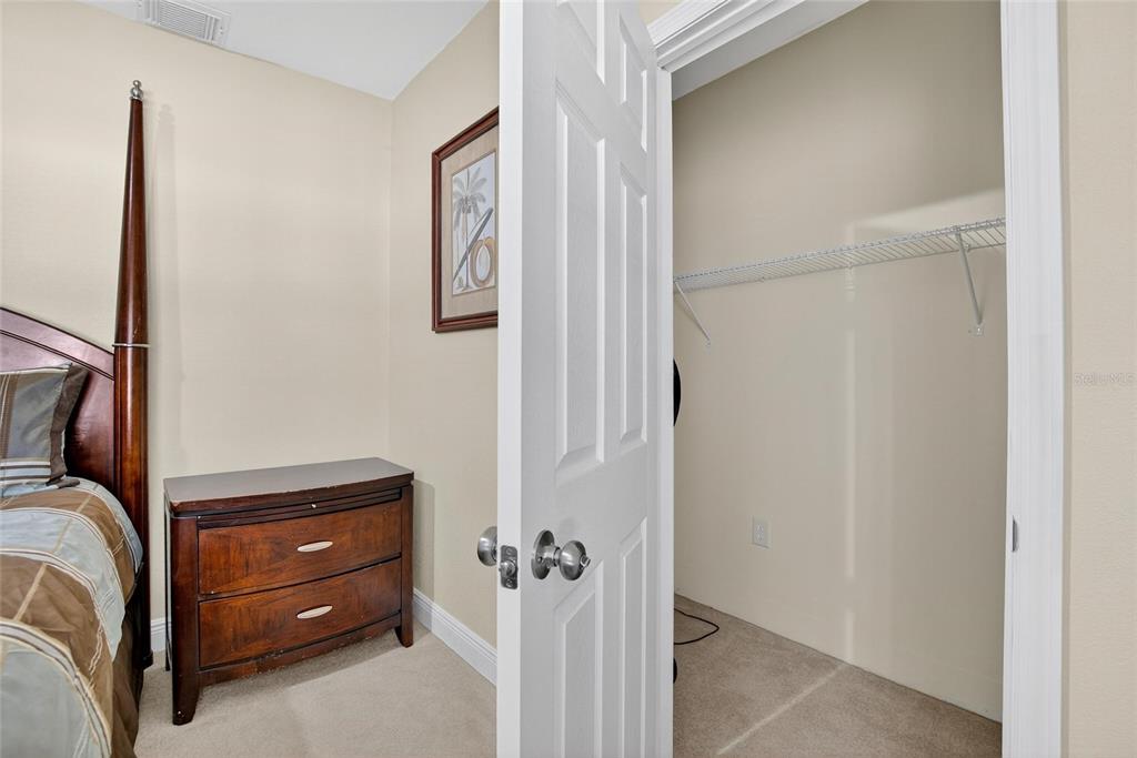 4639 Birdsong Boulevard, Unit 2 Lutz, FL 33559 - Photo 19 of 25 a bathroom with a shower and a sink