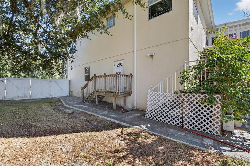 4639 Birdsong Boulevard, Unit 2 Lutz, FL 33559 - Photo 3 of 25 a view of a backyard