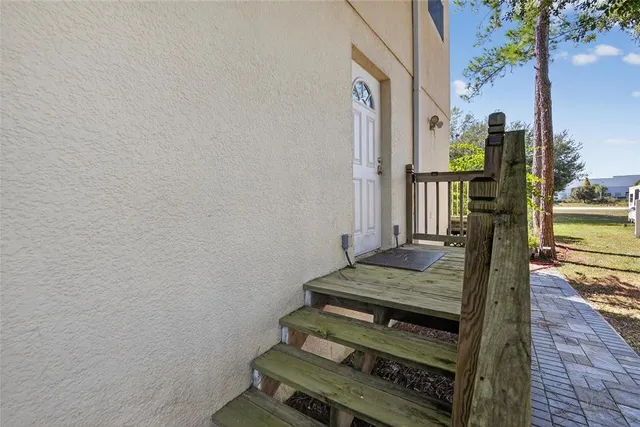 a view of a balcony with chairs