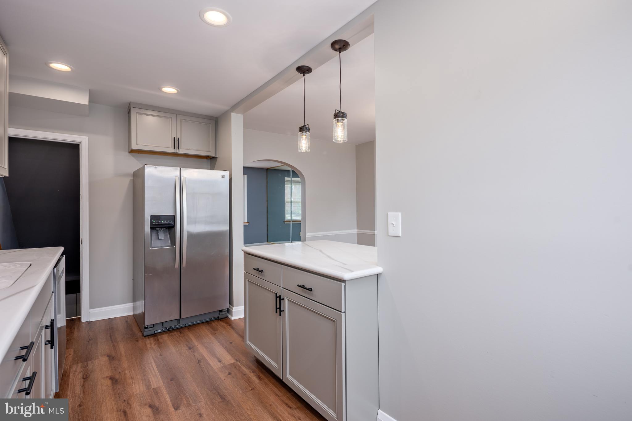1621 Thetford Road Towson, MD 21286 - Photo 13 of 35 a kitchen with stainless steel appliances granite countertop a refrigerator a sink and a stove