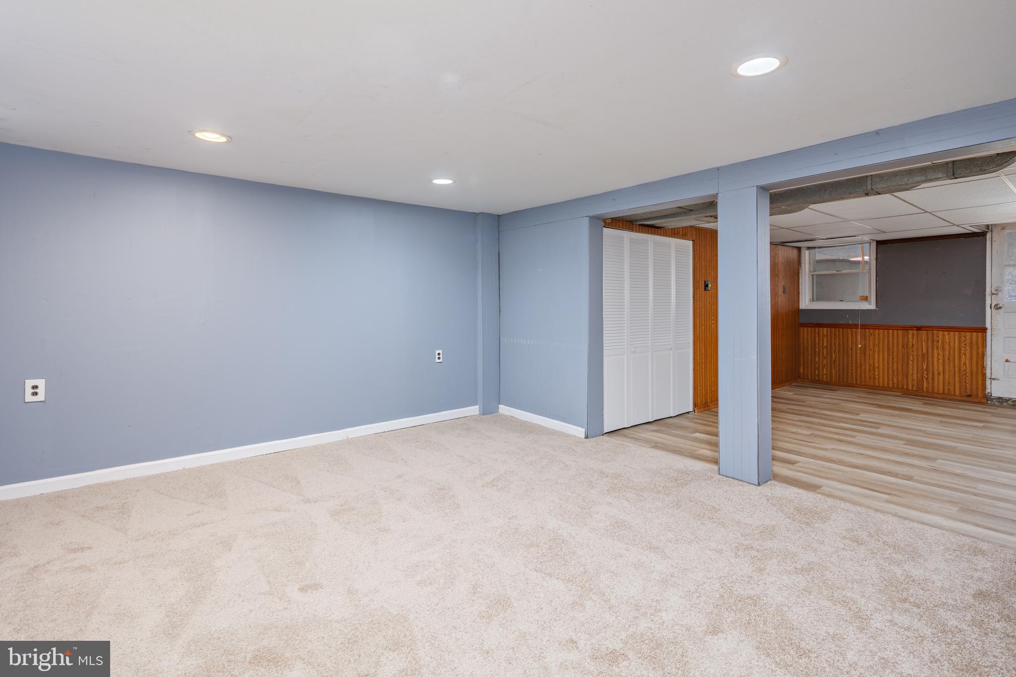 1621 Thetford Road Towson, MD 21286 - Photo 24 of 35 an empty room with wooden floor and way to kitchen