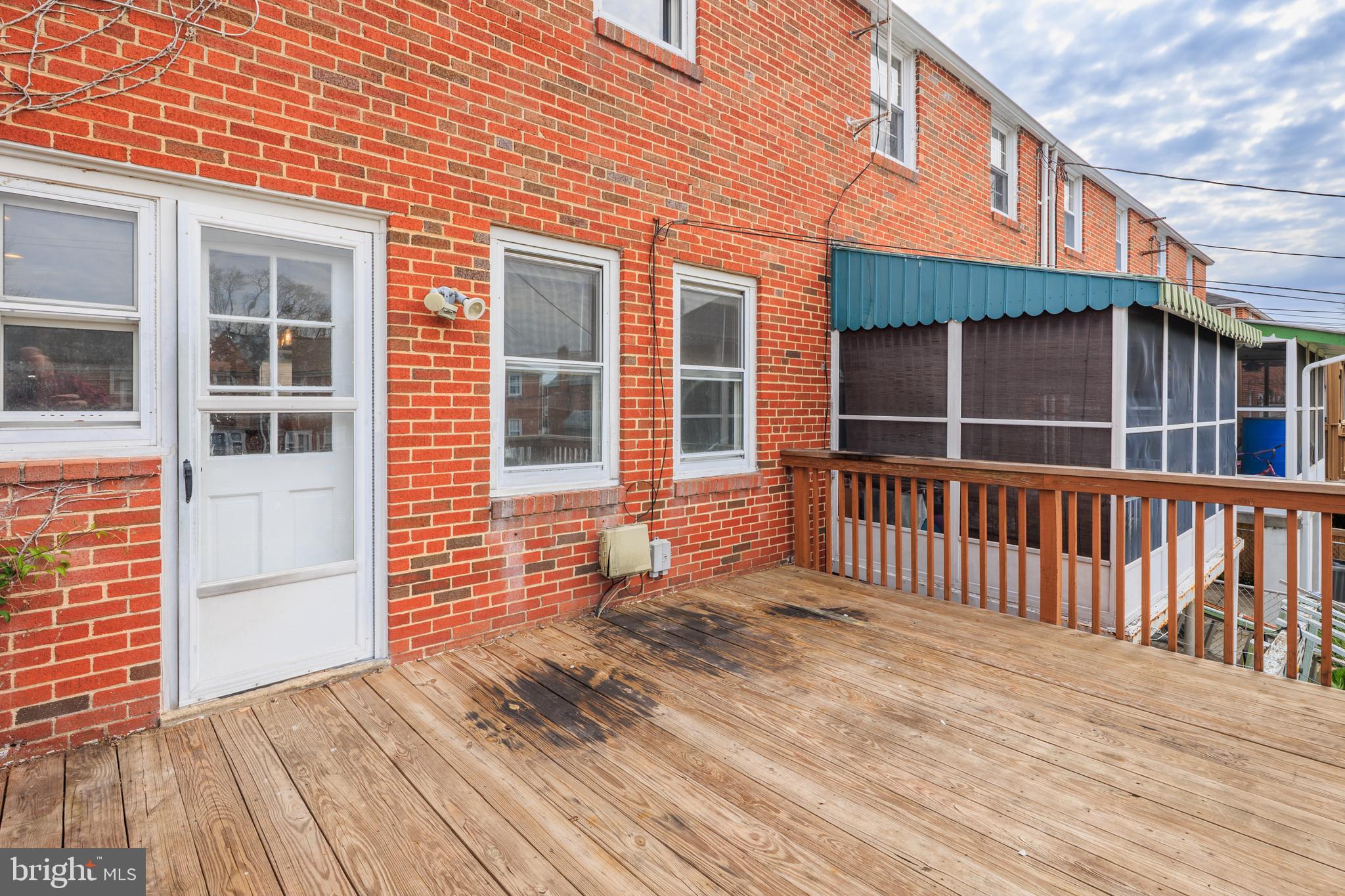 1621 Thetford Road Towson, MD 21286 - Photo 30 of 35 a porch with a table and chairs