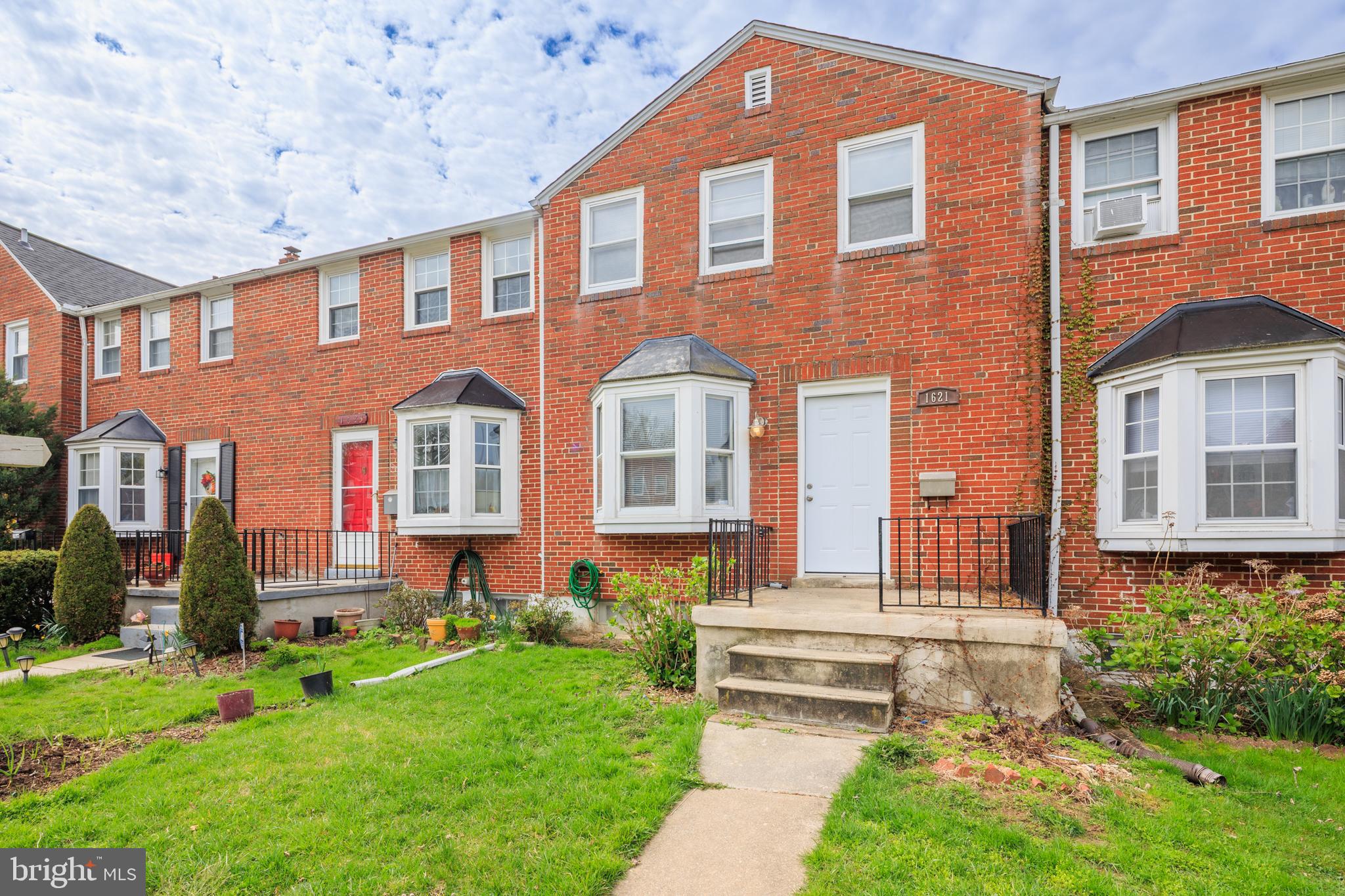 1621 Thetford Road Towson, MD 21286 - Photo 32 of 35 a front view of a house with a yard