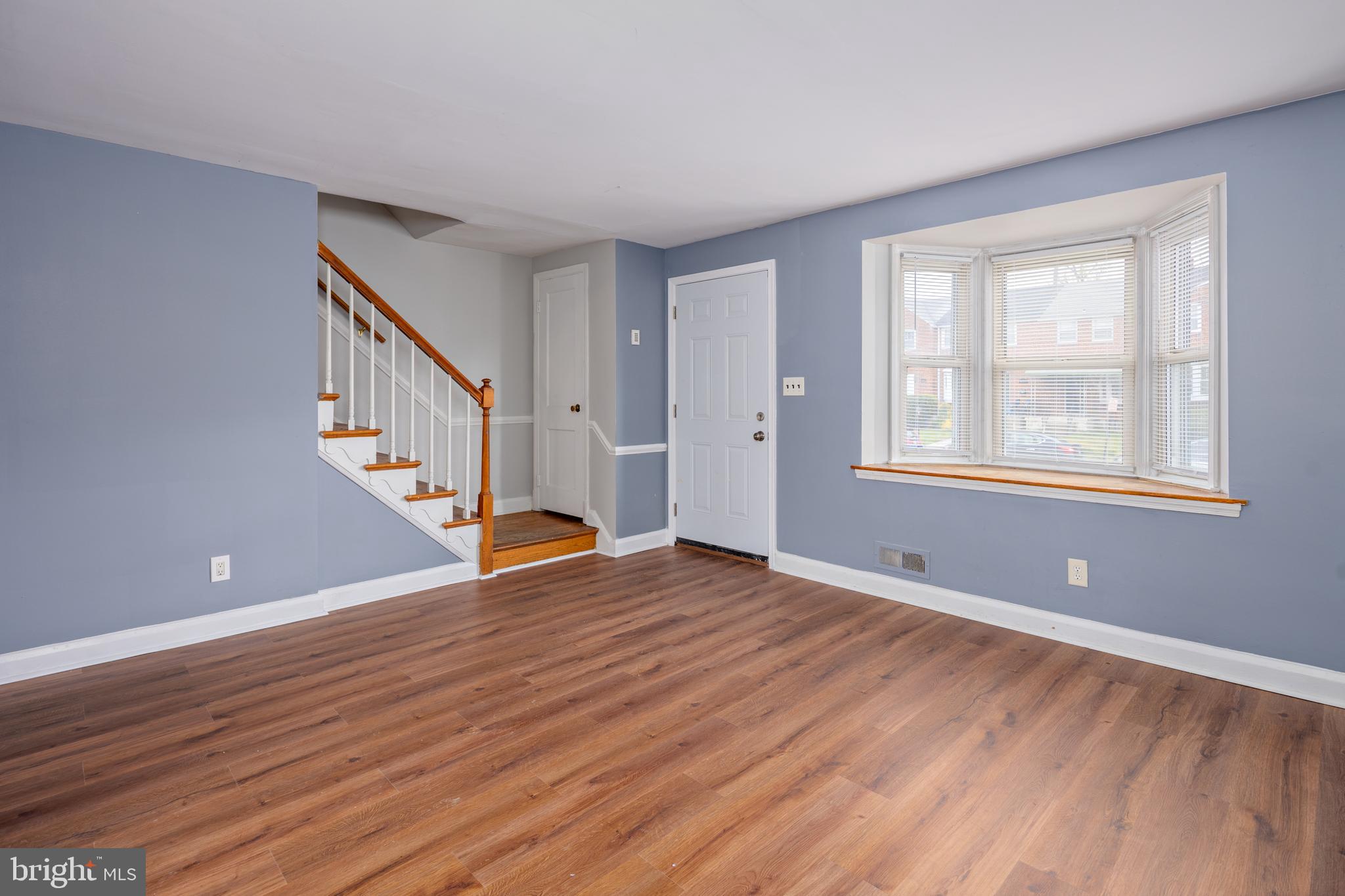 1621 Thetford Road Towson, MD 21286 - Photo 5 of 35 a view of empty room with wooden floor and fan