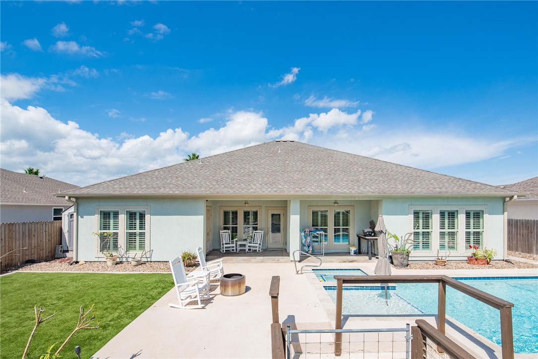 15614 Cuttysark Street Corpus Christi, TX 78418 - Photo 29 of 40 Beautiful Backyard Oasis w/ turf, pool, and hot tu