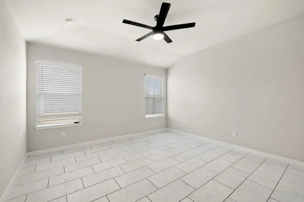 a bathroom with a shower sink and mirror
