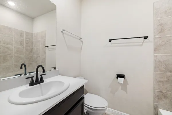 a view of hallway with washer and dryer