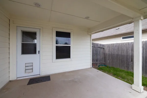 a view of a back yard of the house