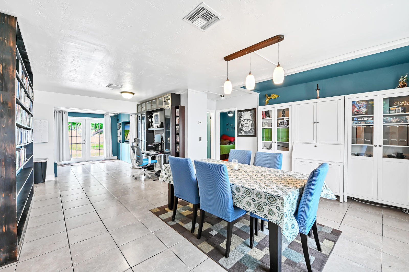 344 Winged Foot Road Palm Springs, FL 33461 - Photo 4 of 20 a view of a dining room with furniture and window
