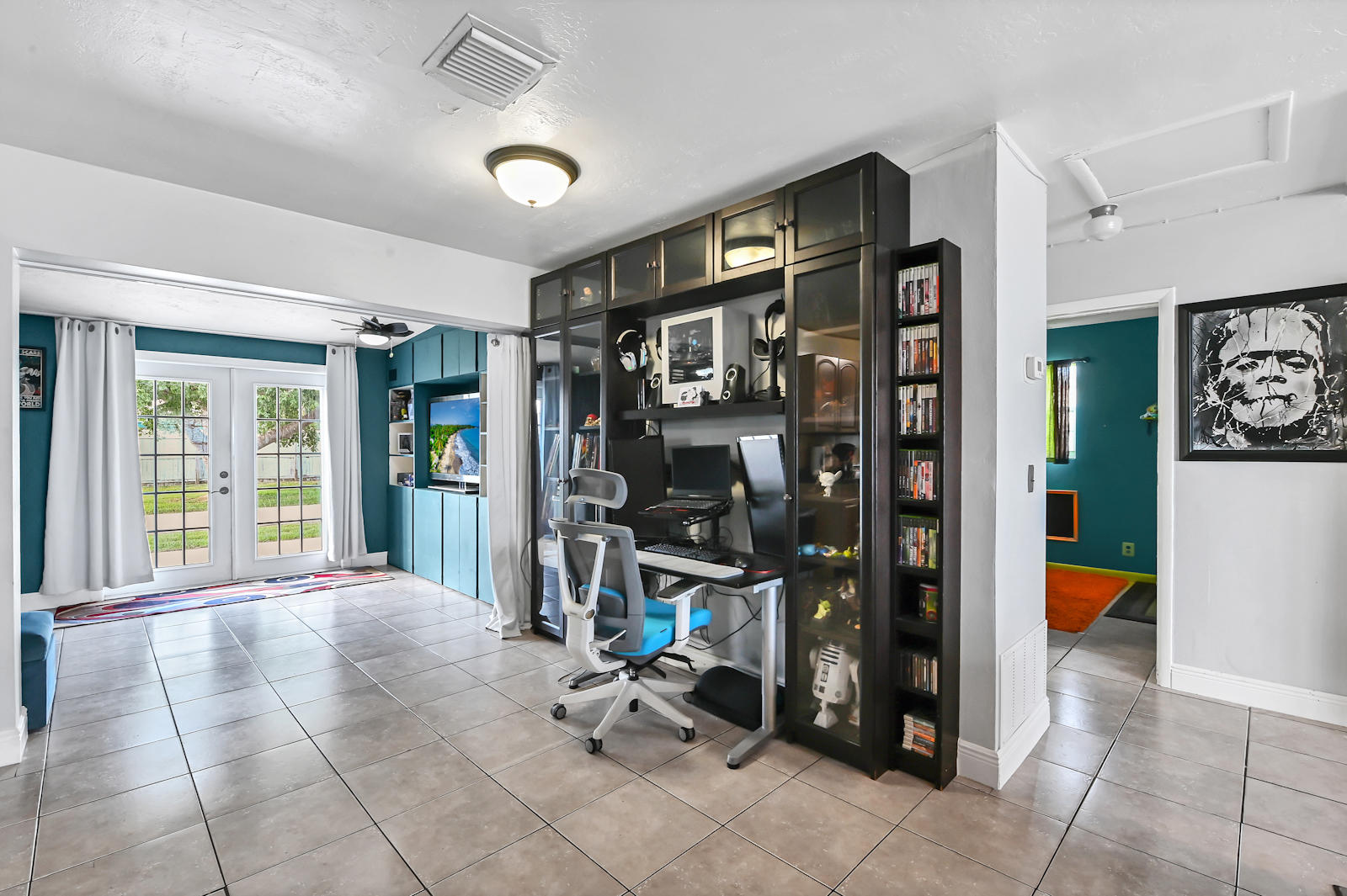 344 Winged Foot Road Palm Springs, FL 33461 - Photo 5 of 20 a view of a room with gym equipment