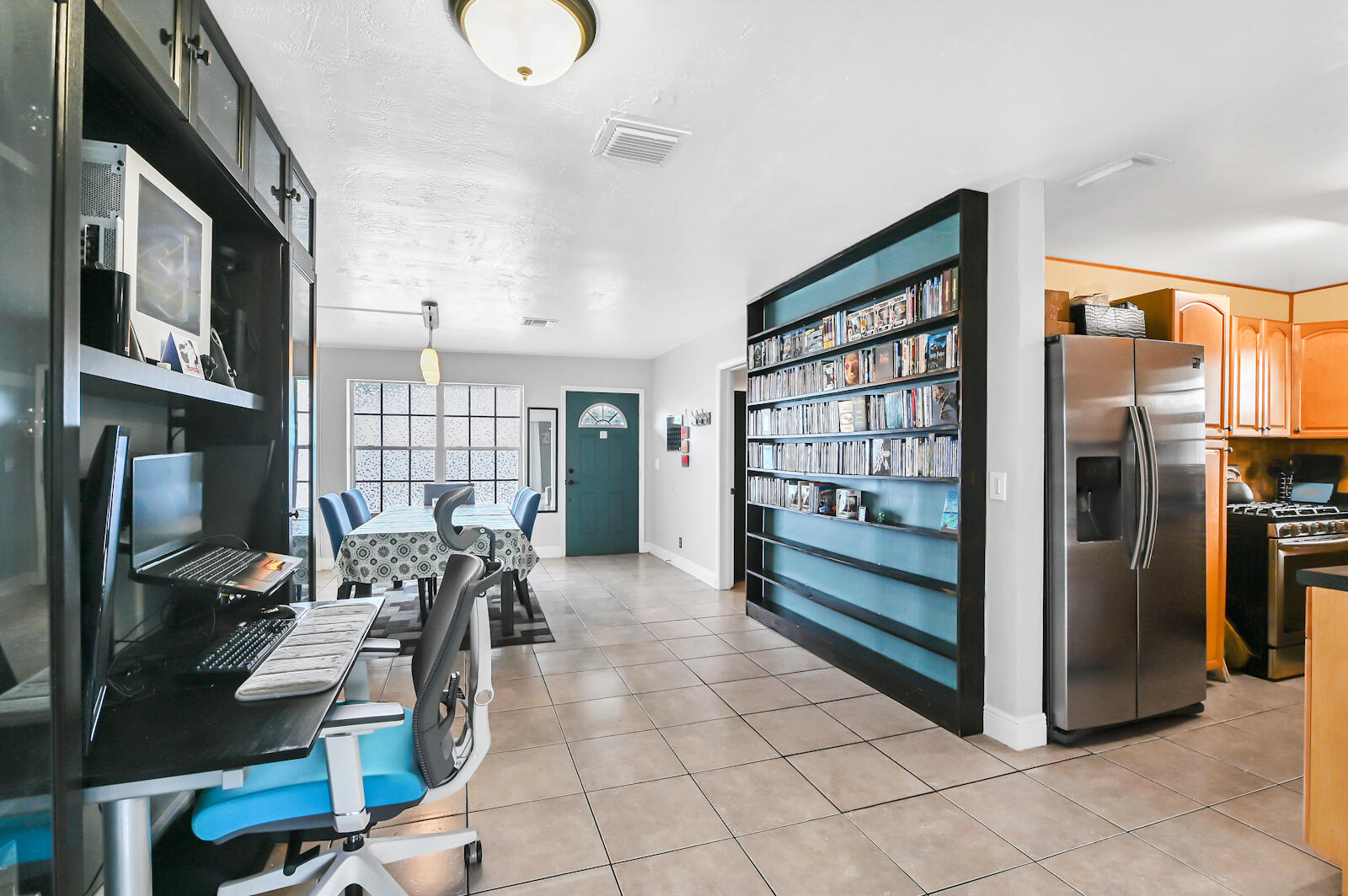 344 Winged Foot Road Palm Springs, FL 33461 - Photo 7 of 20 a view of a living room and entry way