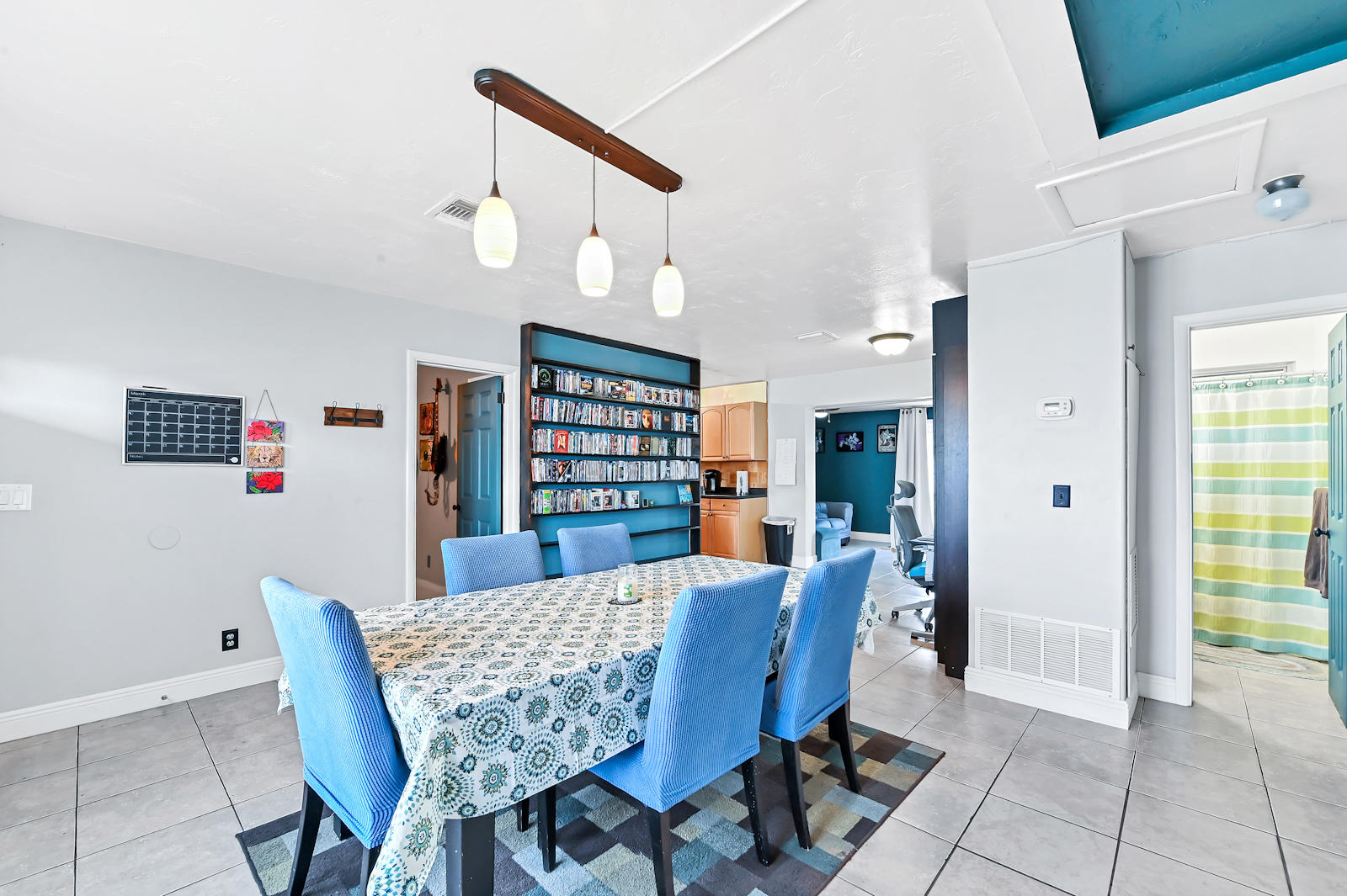 344 Winged Foot Road Palm Springs, FL 33461 - Photo 8 of 20 a view of a dining room with furniture