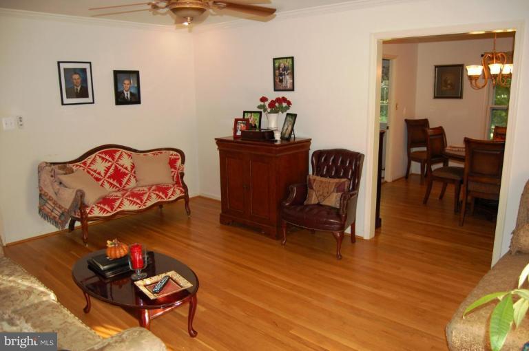 8263 Toll House Road Annandale, VA 22003 - Photo 16 of 24 a living room with furniture and wooden floor