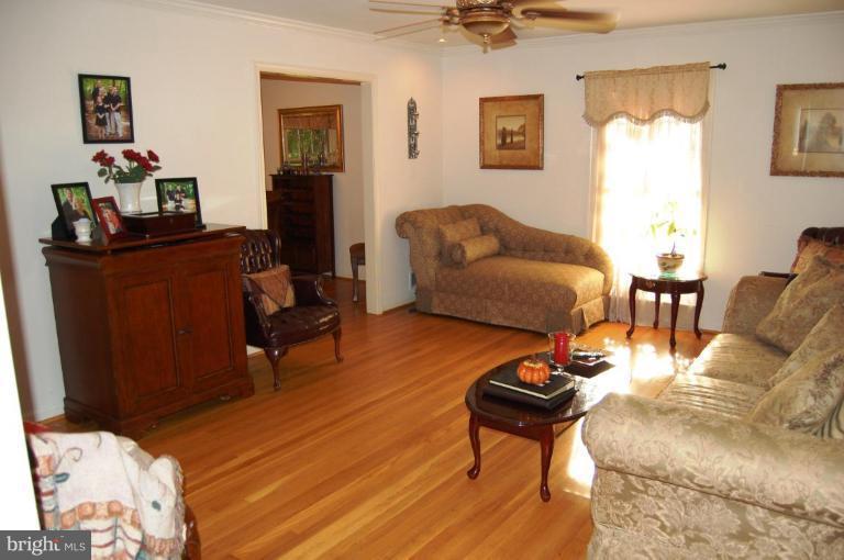 8263 Toll House Road Annandale, VA 22003 - Photo 17 of 24 a living room with furniture and a wooden floor