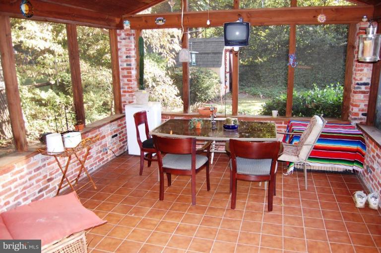 8263 Toll House Road Annandale, VA 22003 - Photo 20 of 24 a outdoor dining space with furniture and outdoor view