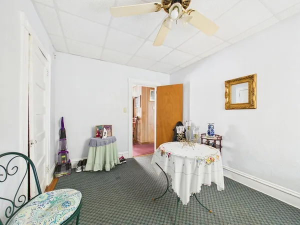 a bedroom with a bed and a table