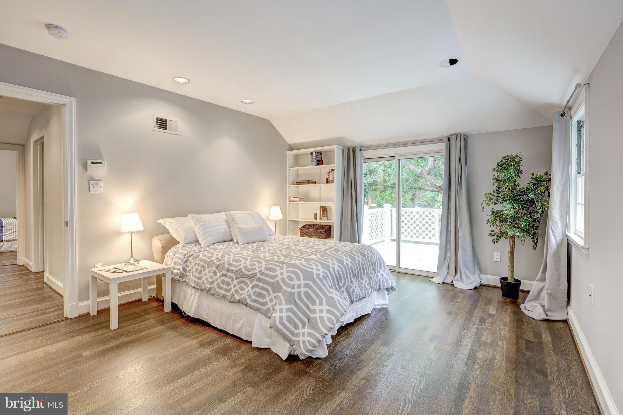 5911 Cobalt Road Bethesda, MD 20816 - Photo 13 of 27 MBR with recessed lighting, doors lead to balcony