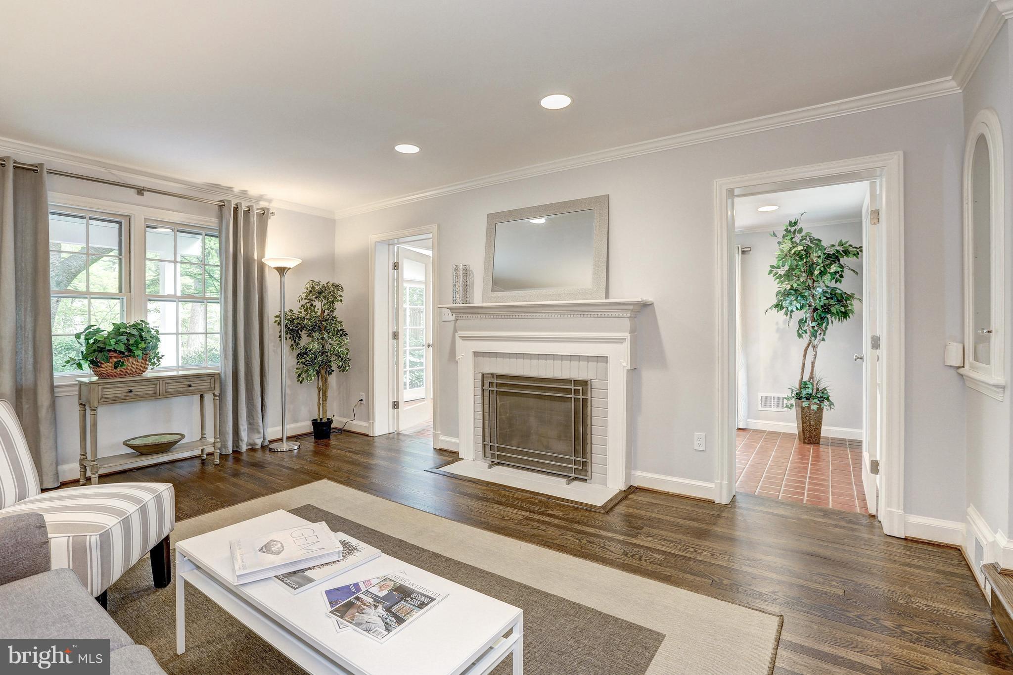5911 Cobalt Road Bethesda, MD 20816 - Photo 3 of 27 Living Room w/ wood burning fireplace