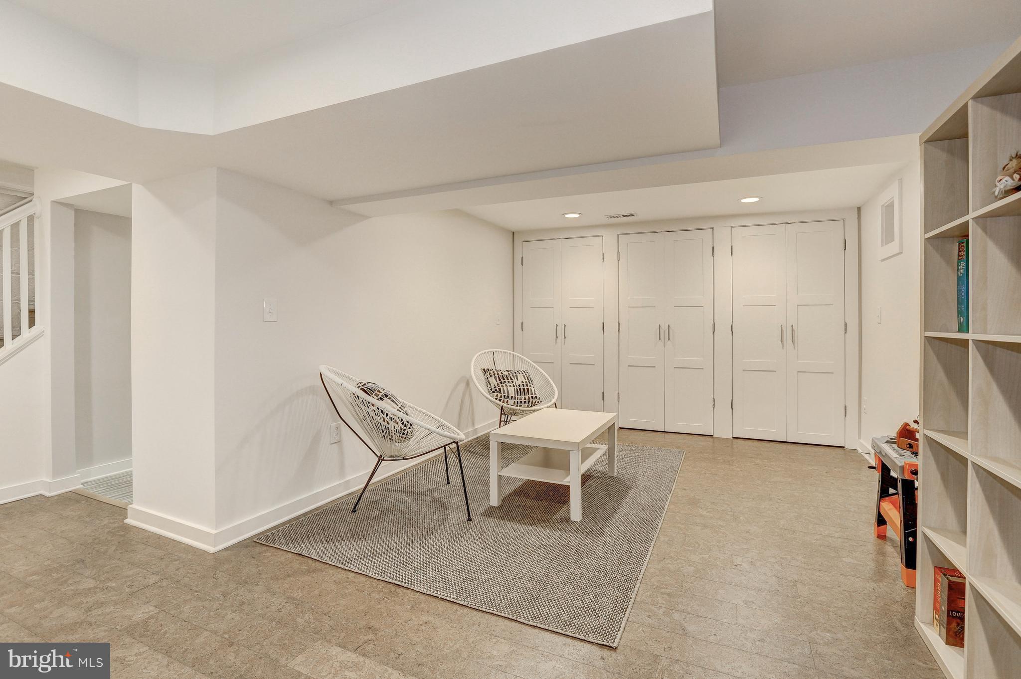 5911 Cobalt Road Bethesda, MD 20816 - Photo 23 of 27 Family room/play room with wall of closets!