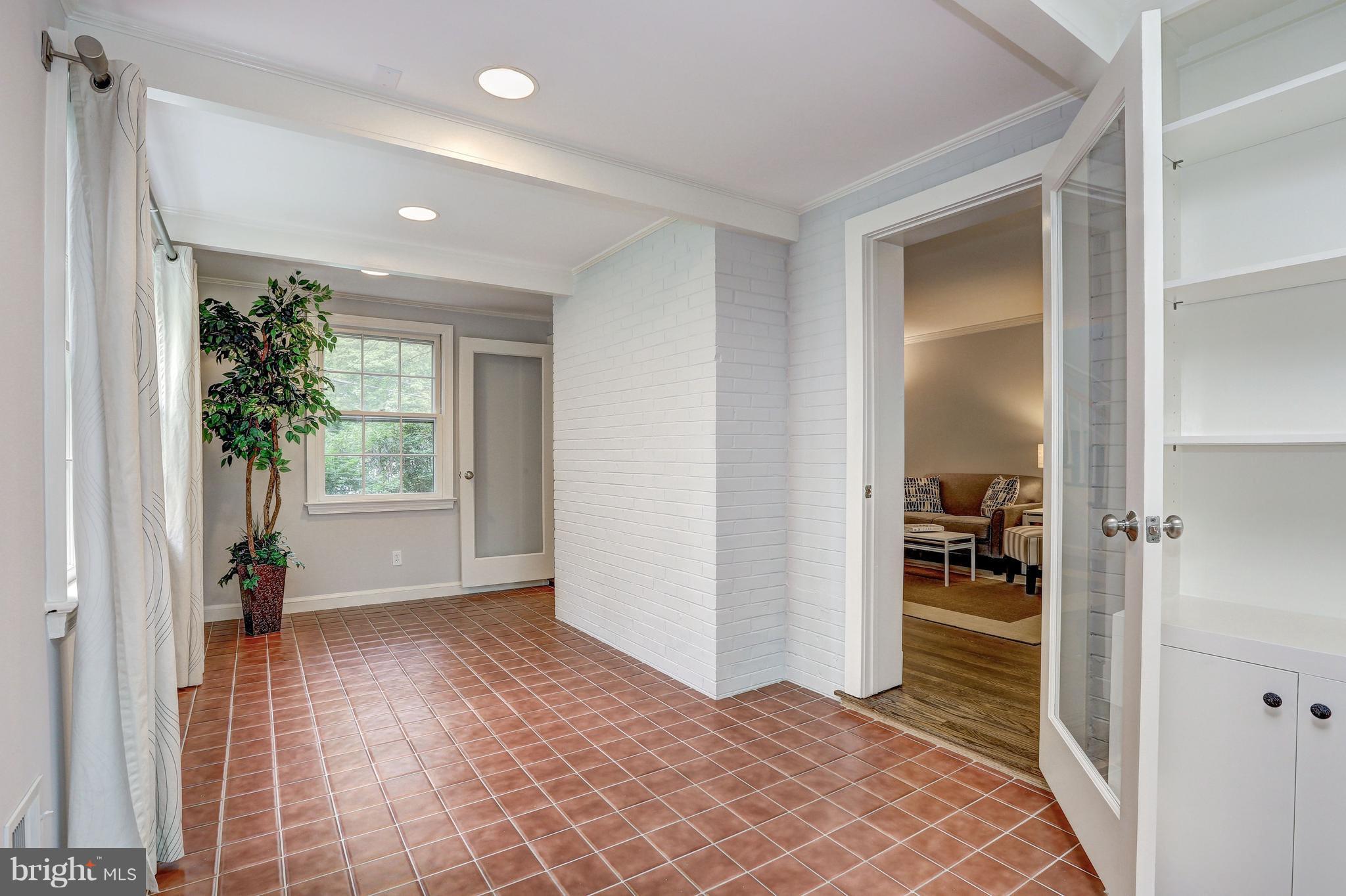 5911 Cobalt Road Bethesda, MD 20816 - Photo 5 of 27 Office/study w/ tile floor & walls of windows