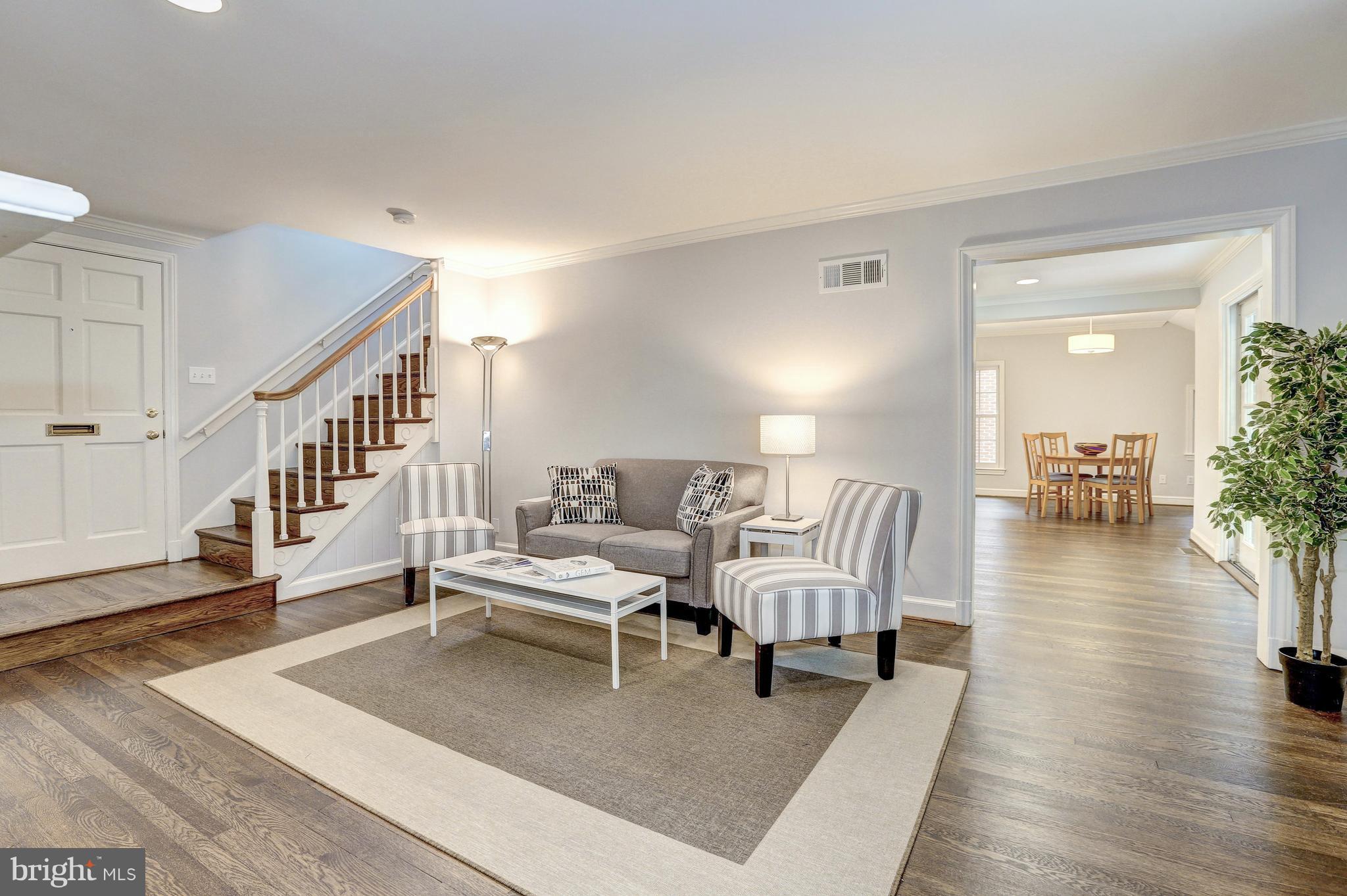 5911 Cobalt Road Bethesda, MD 20816 - Photo 6 of 27 Living Room w/passage to kitchen and dining area