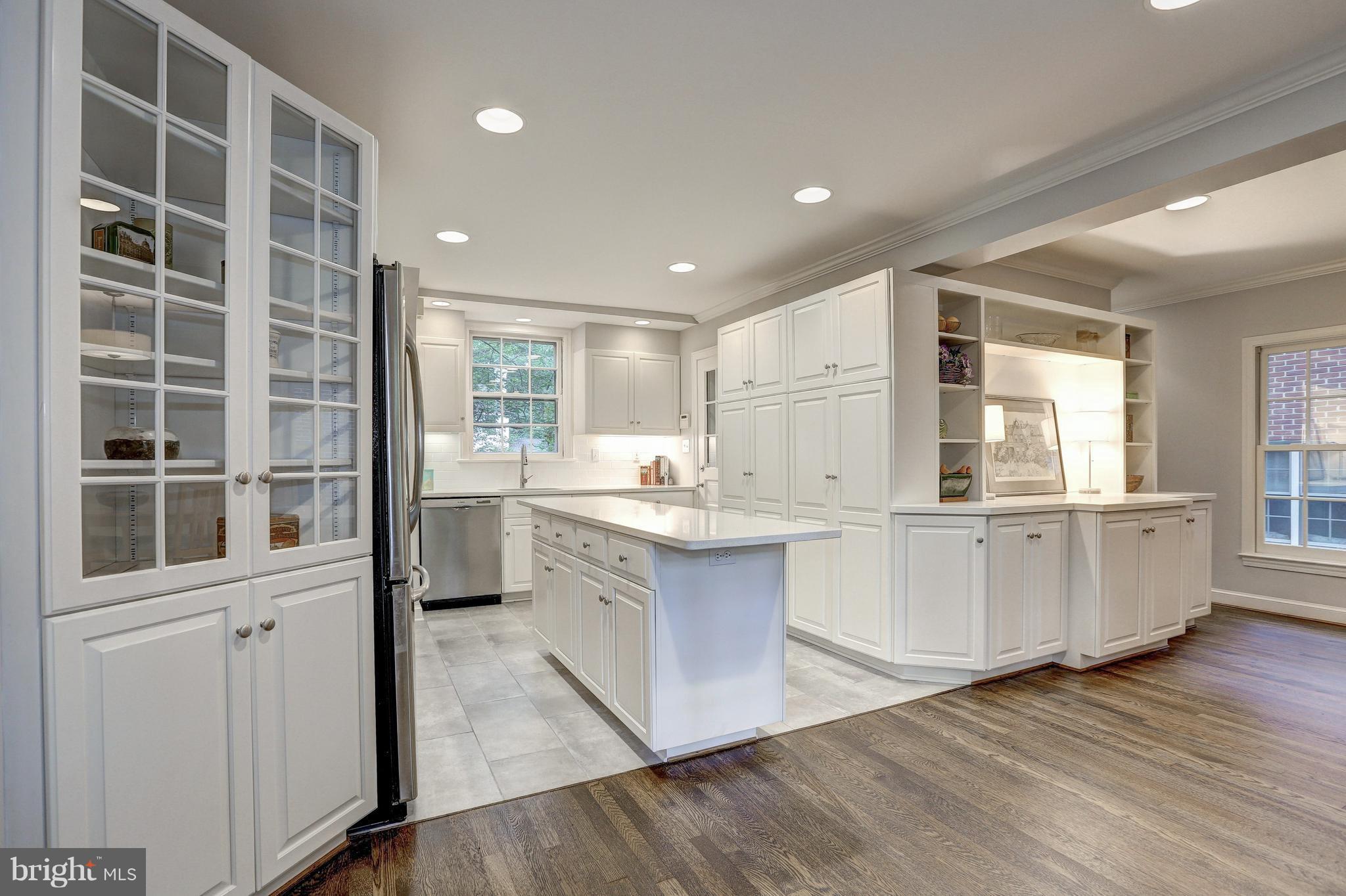 5911 Cobalt Road Bethesda, MD 20816 - Photo 7 of 27 New quartz counters, tile floor, backsplash, sink