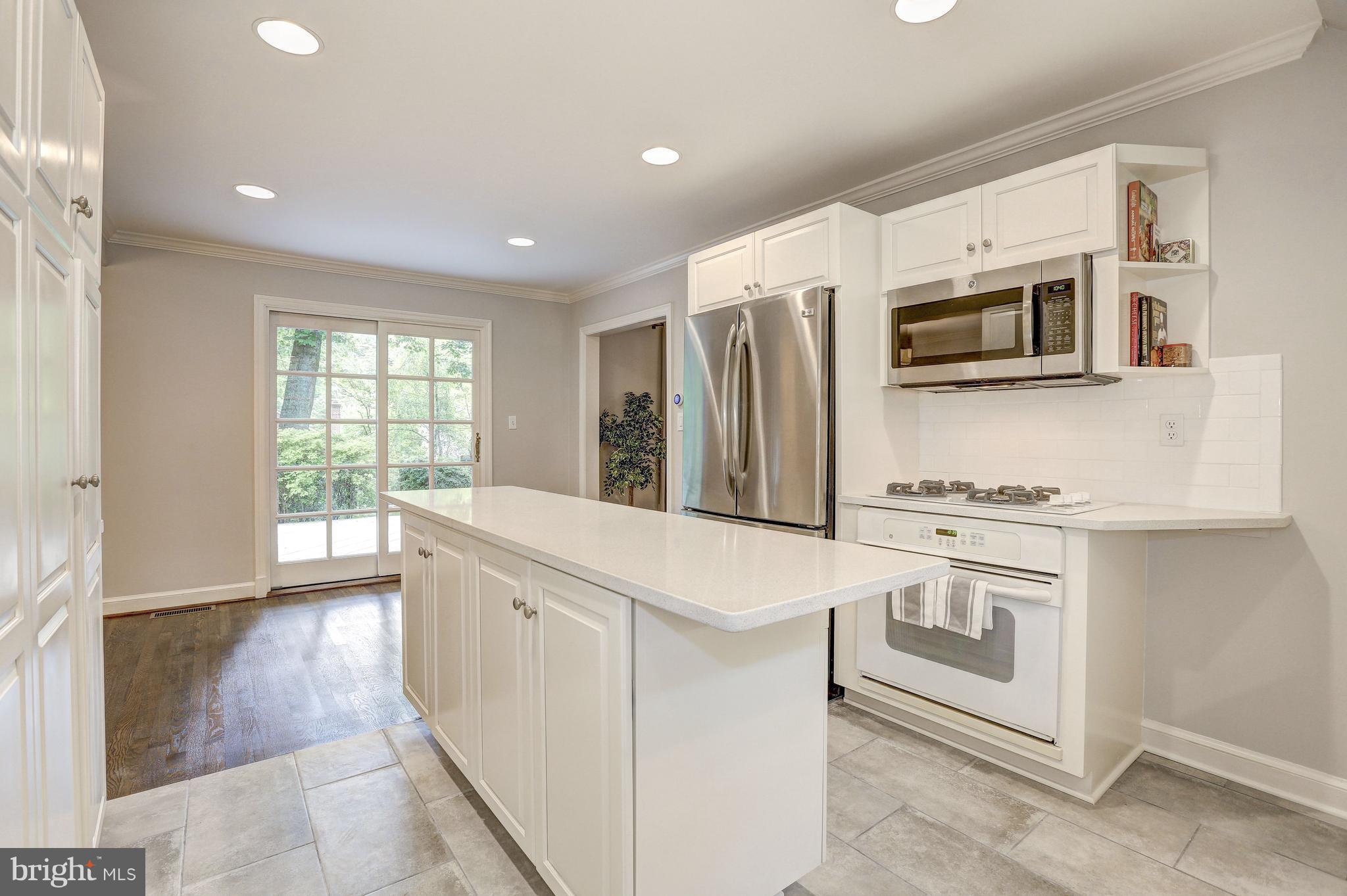 5911 Cobalt Road Bethesda, MD 20816 - Photo 8 of 27 Kit. island, lots of cabinets, light filled space
