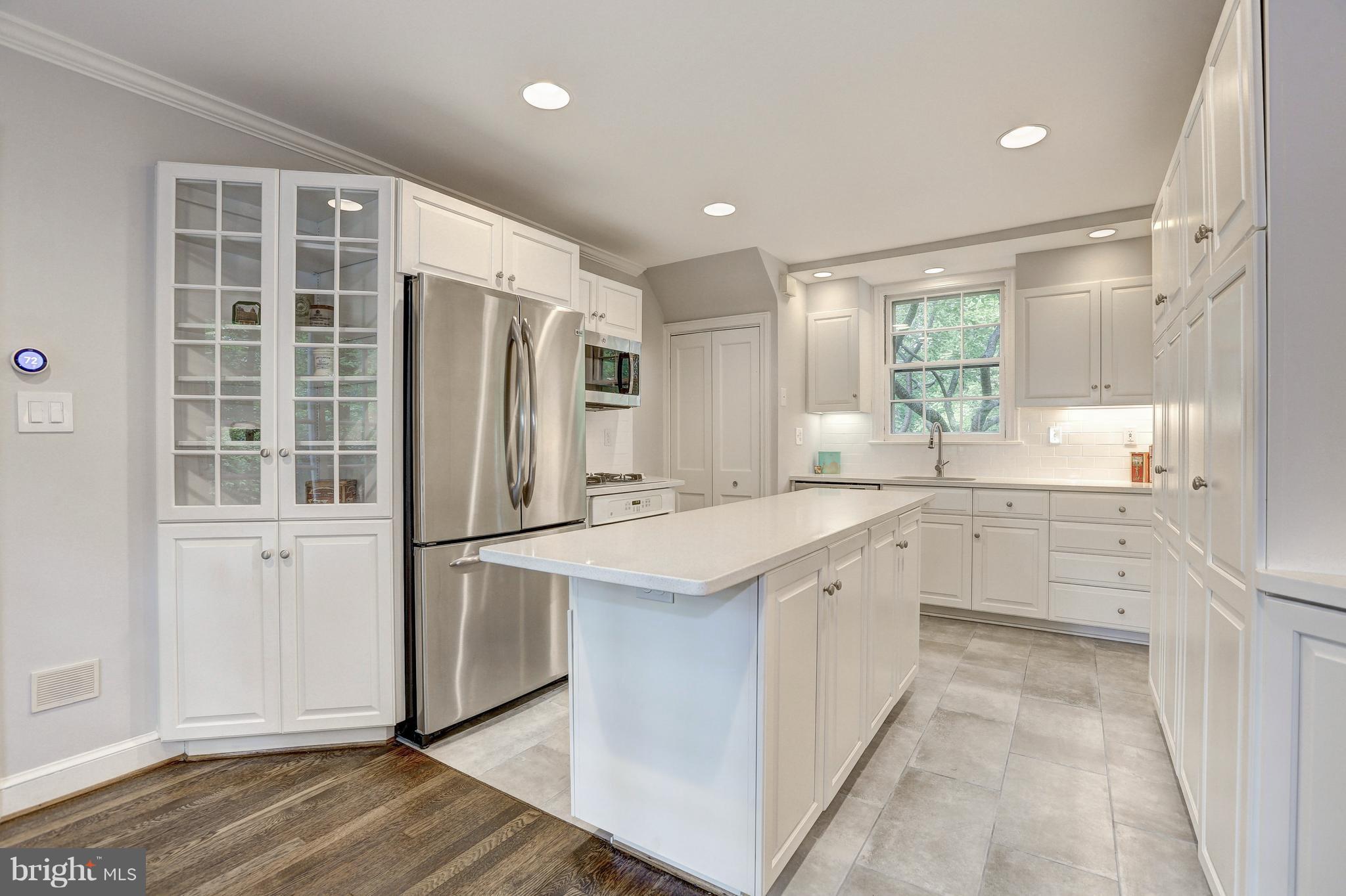 5911 Cobalt Road Bethesda, MD 20816 - Photo 9 of 27 Built in china cabinet, recessed lighting