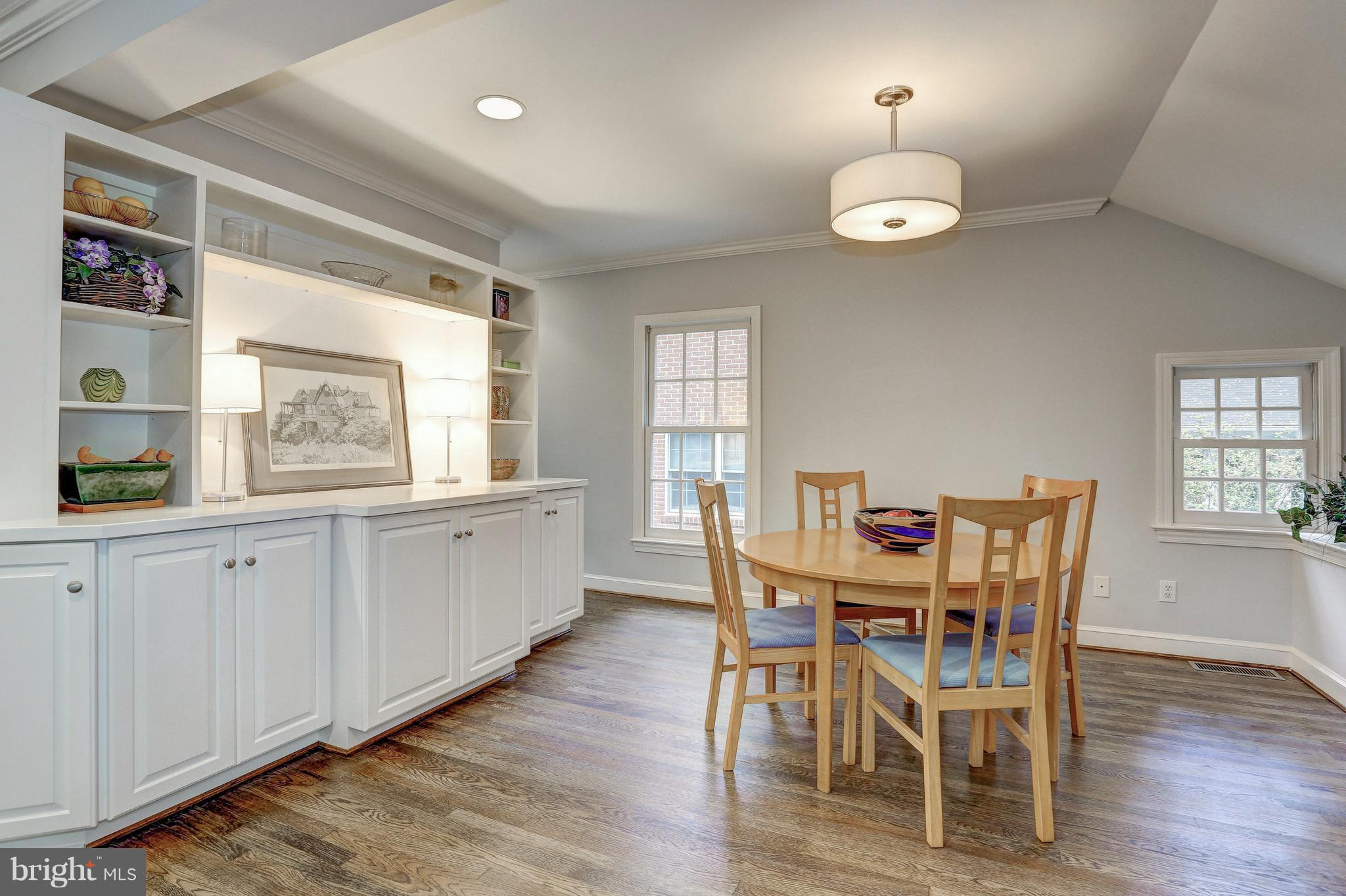 5911 Cobalt Road Bethesda, MD 20816 - Photo 10 of 27 Dining area with built in shelving & cabinets