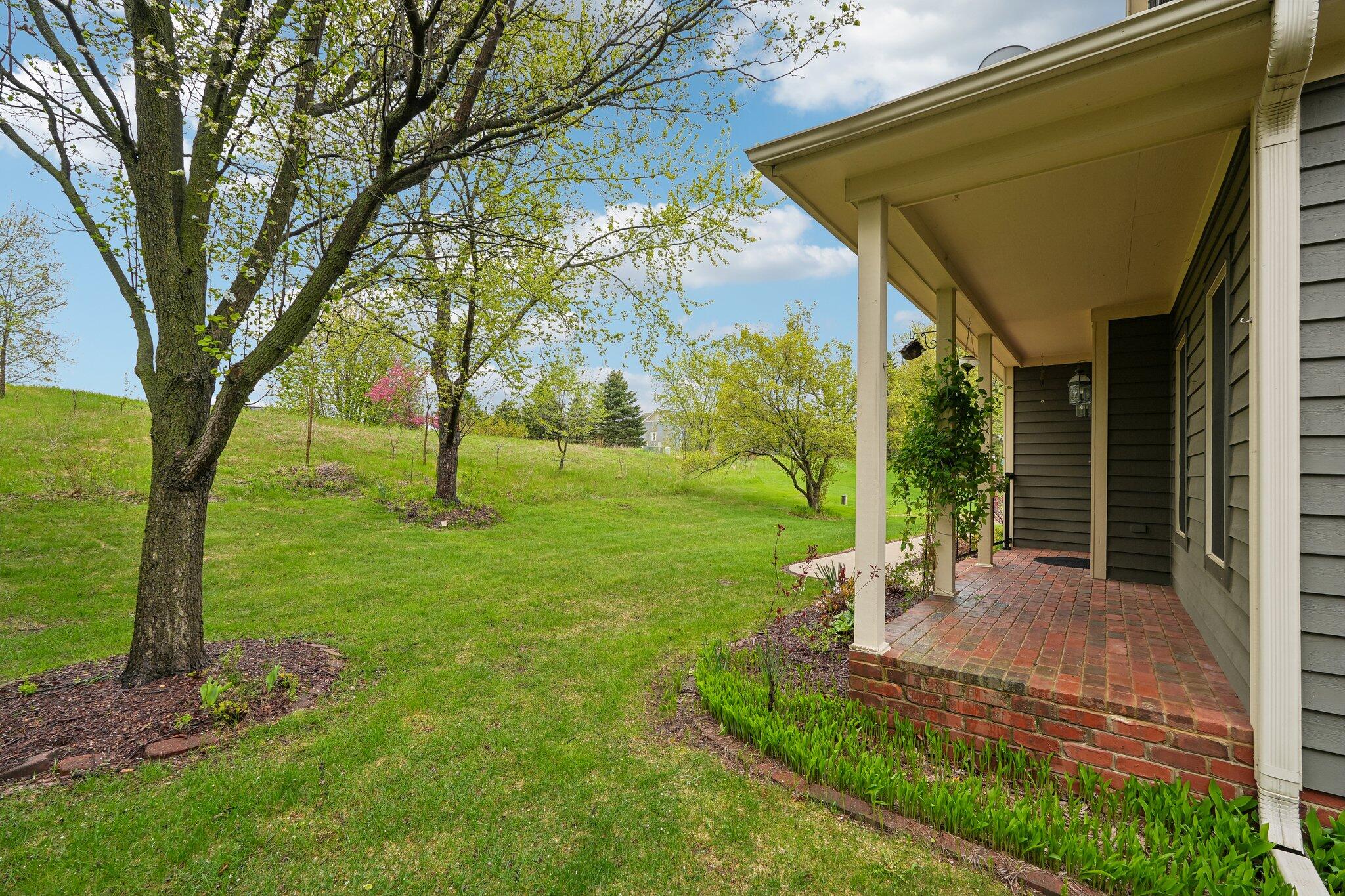 398 Oneida Street Delafield, WI 53018 - Photo 9 of 53 Relax on the porch