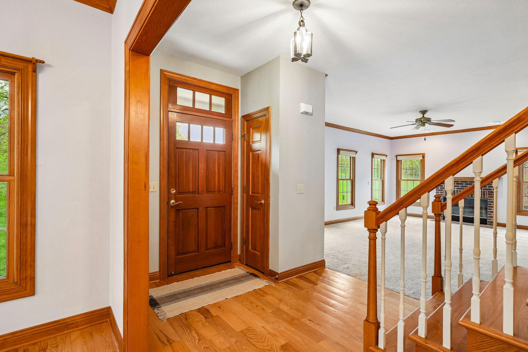 398 Oneida Street Delafield, WI 53018 - Photo 10 of 53 Hardwood floors welcome you