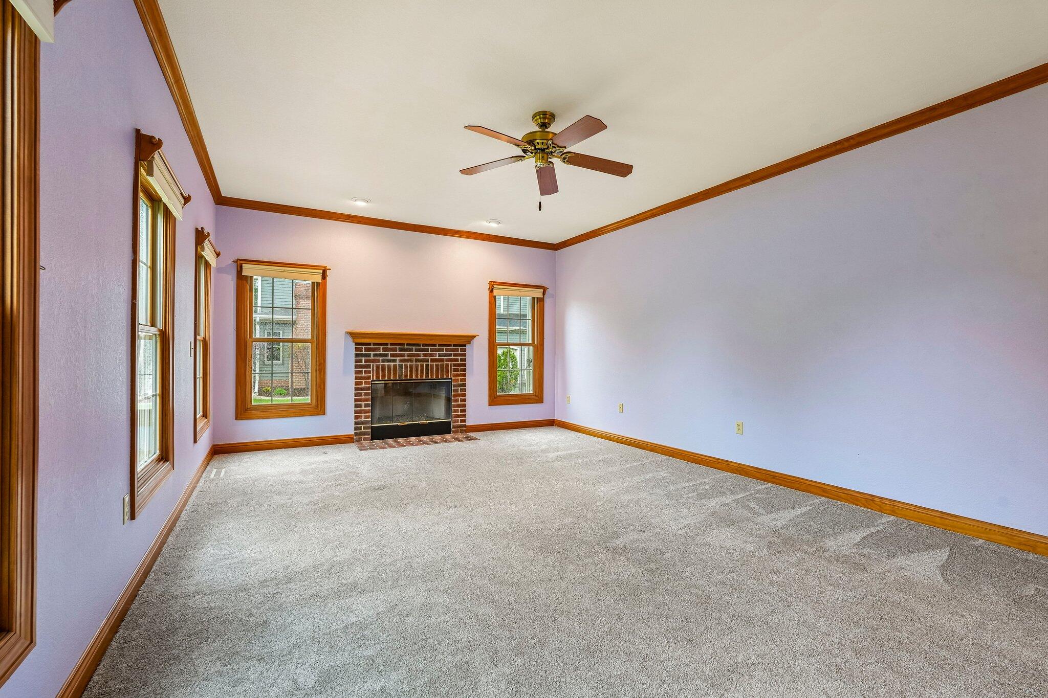 398 Oneida Street Delafield, WI 53018 - Photo 14 of 53 Living room with gas fireplace