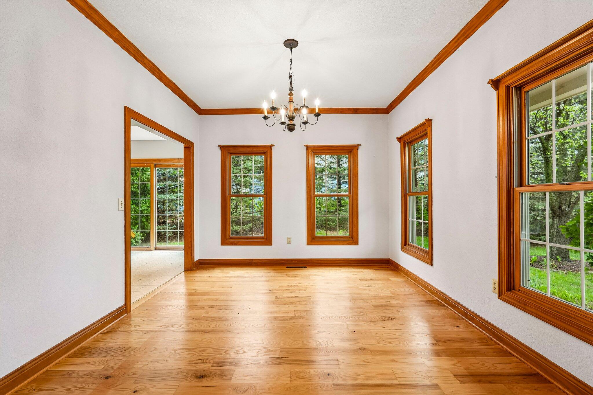 398 Oneida Street Delafield, WI 53018 - Photo 17 of 53 Dining room with hardwood floors
