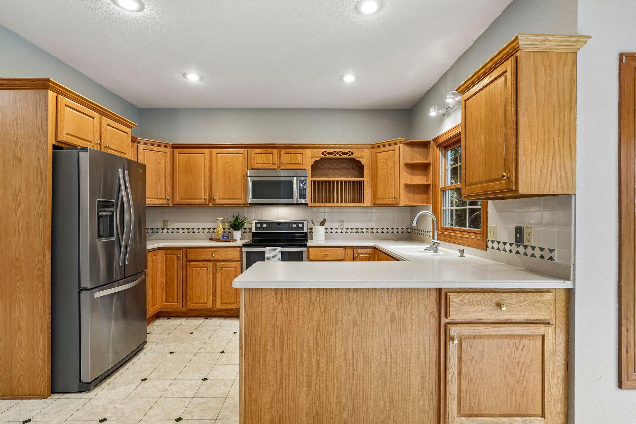 398 Oneida Street Delafield, WI 53018 - Photo 22 of 53 So much cabinet and counter space!