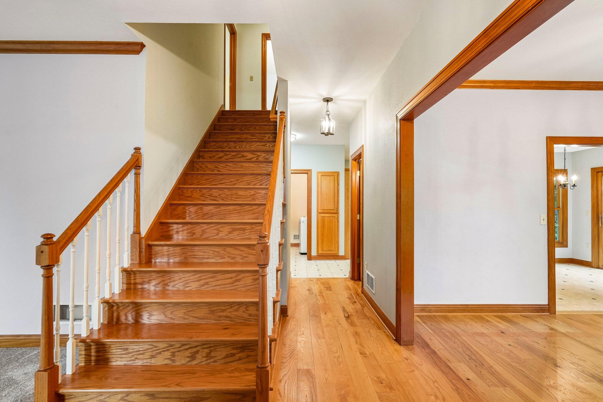 398 Oneida Street Delafield, WI 53018 - Photo 30 of 53 Hardwood open staircase!