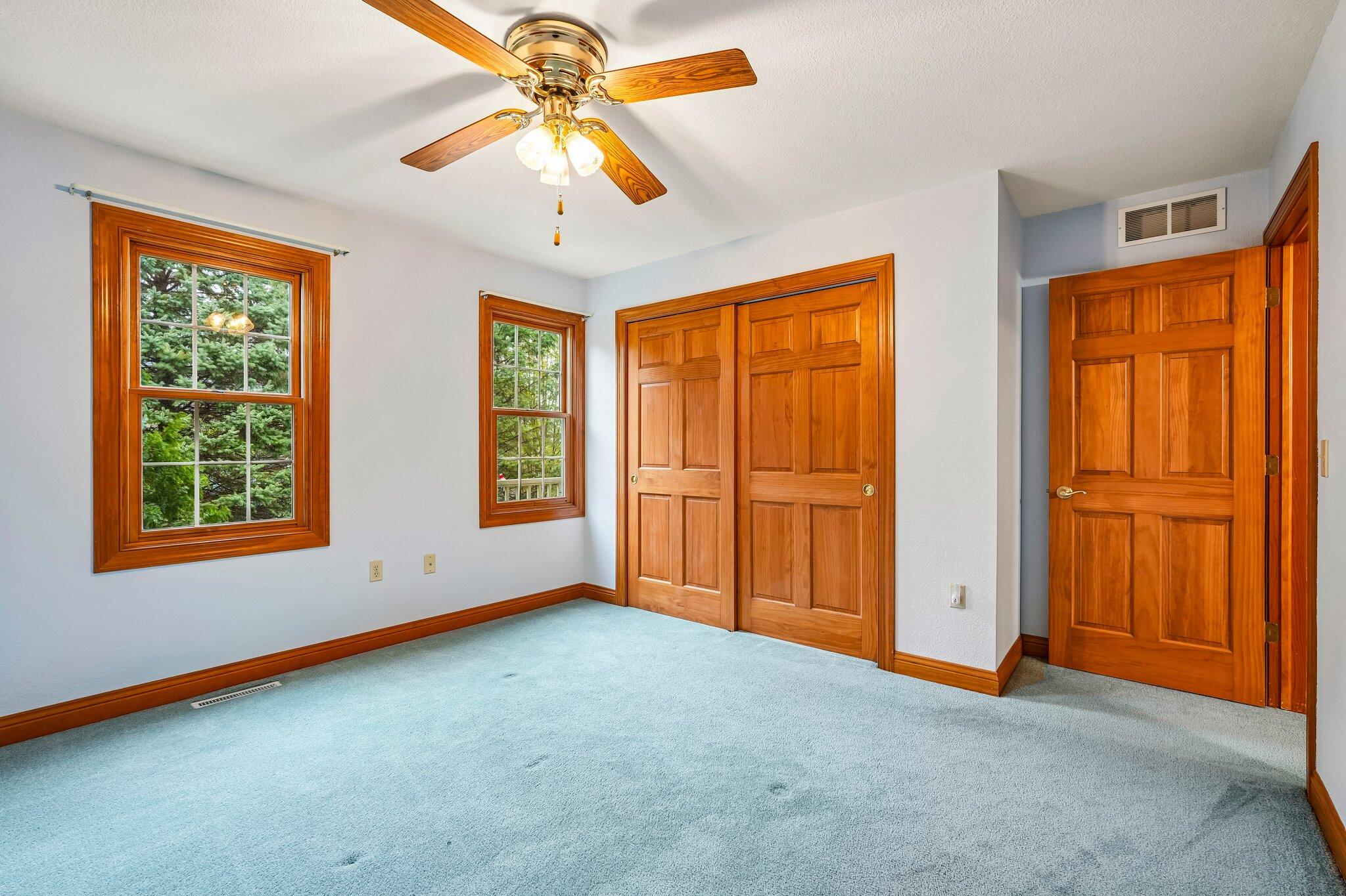 398 Oneida Street Delafield, WI 53018 - Photo 42 of 53 Bedroom with double door closet