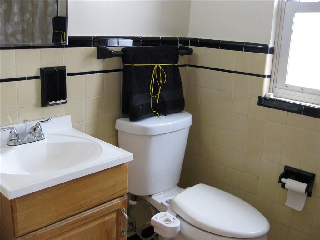 438 Woodland Road Pittsburgh, PA 15237 - Photo 14 of 25 2nd floor full bath with shower,window,vanity,tile floor