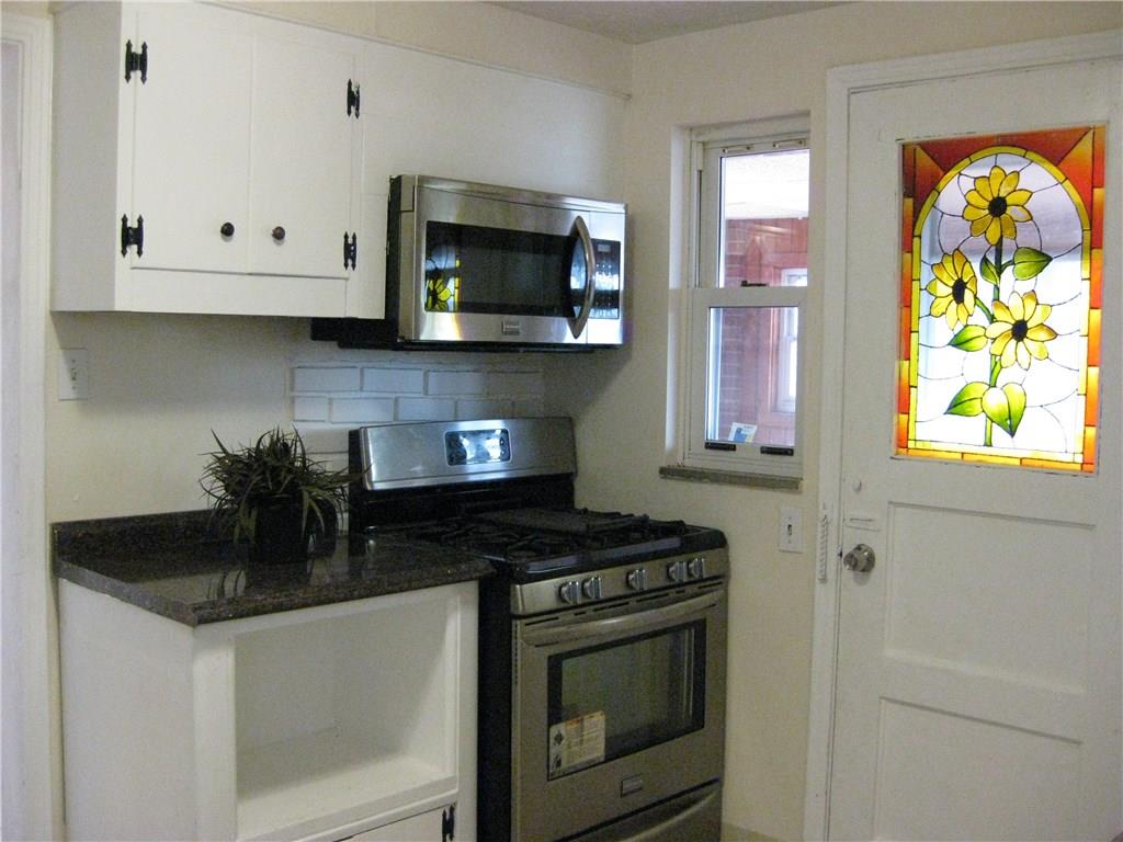 438 Woodland Road Pittsburgh, PA 15237 - Photo 8 of 25 Kitchen door to covered porch