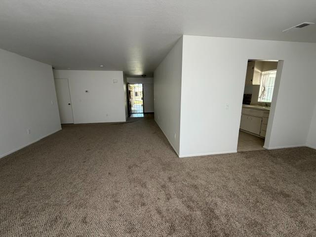2601 Temperate Court Modesto, CA 95358 - Photo 9 of 24 an empty room with windows