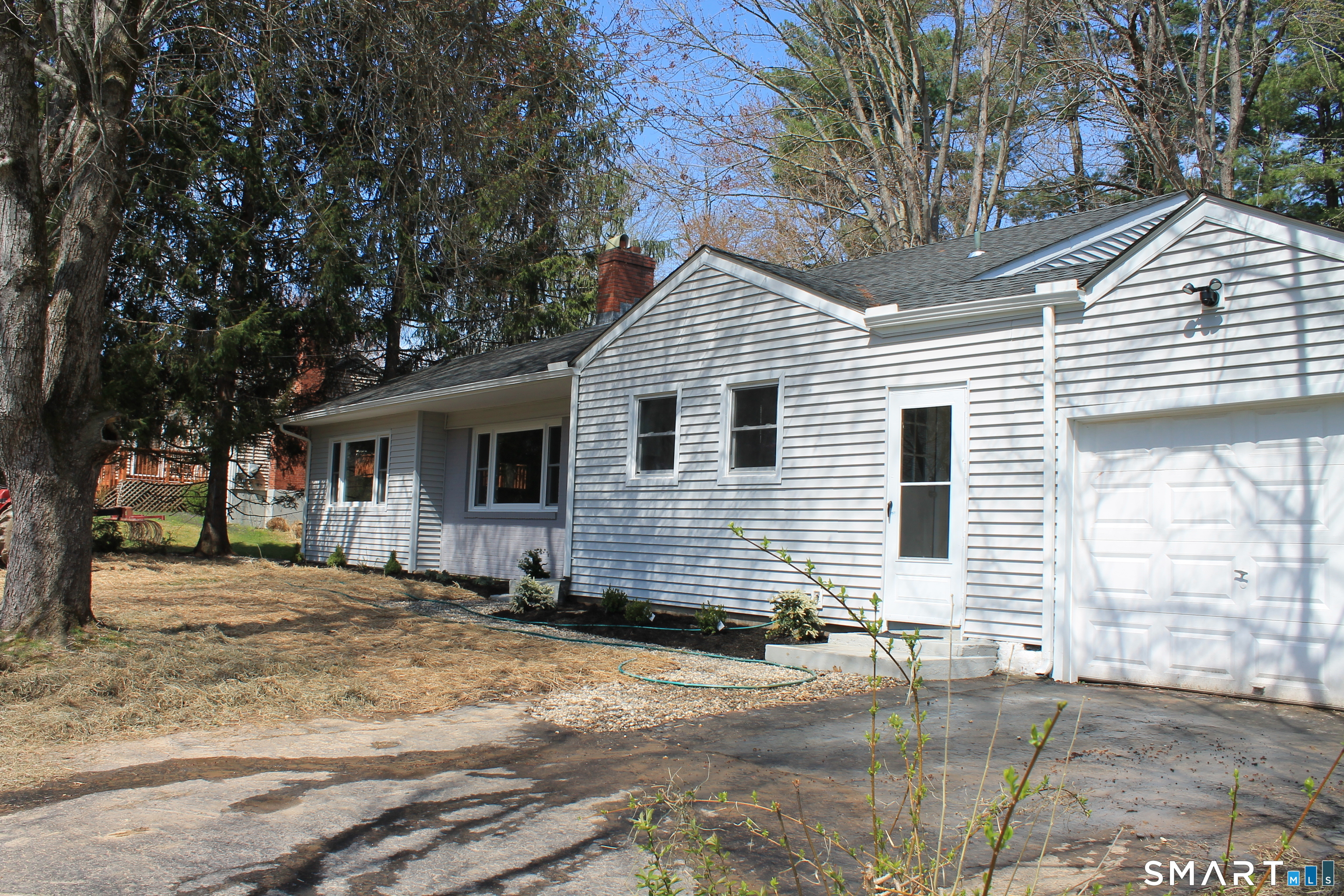 134 Sunset Street Windsor Locks, CT 06096 - Photo 2 of 23 a front view of a house with a yard