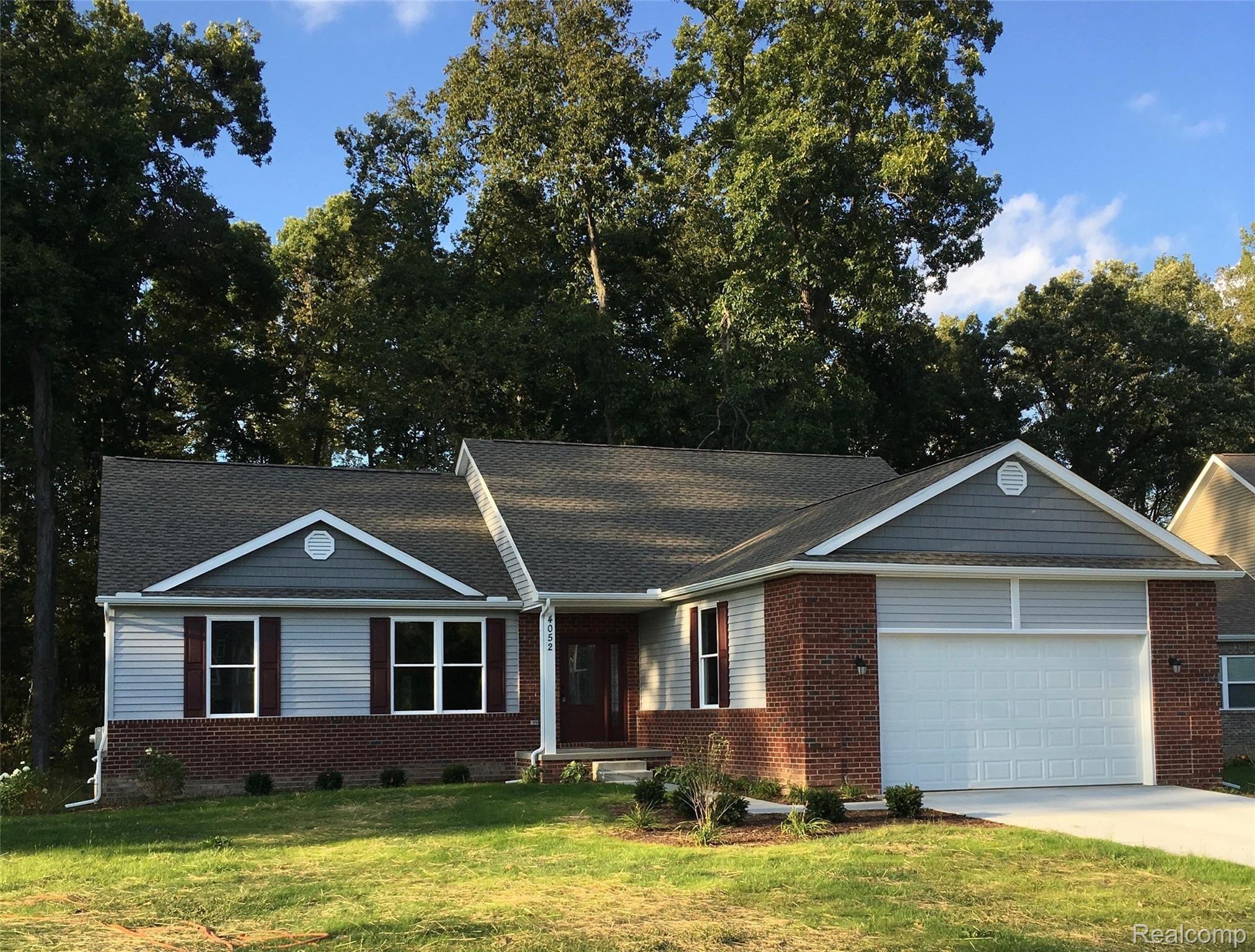 4052 Cameron Court Wixom, MI 48393 - Photo 1 of 28 Front