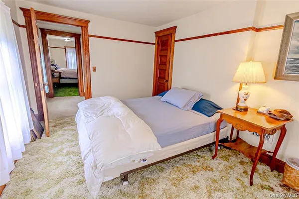 a view of living room with furniture and floor to ceiling window