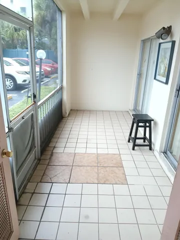 a view of an empty room and windows