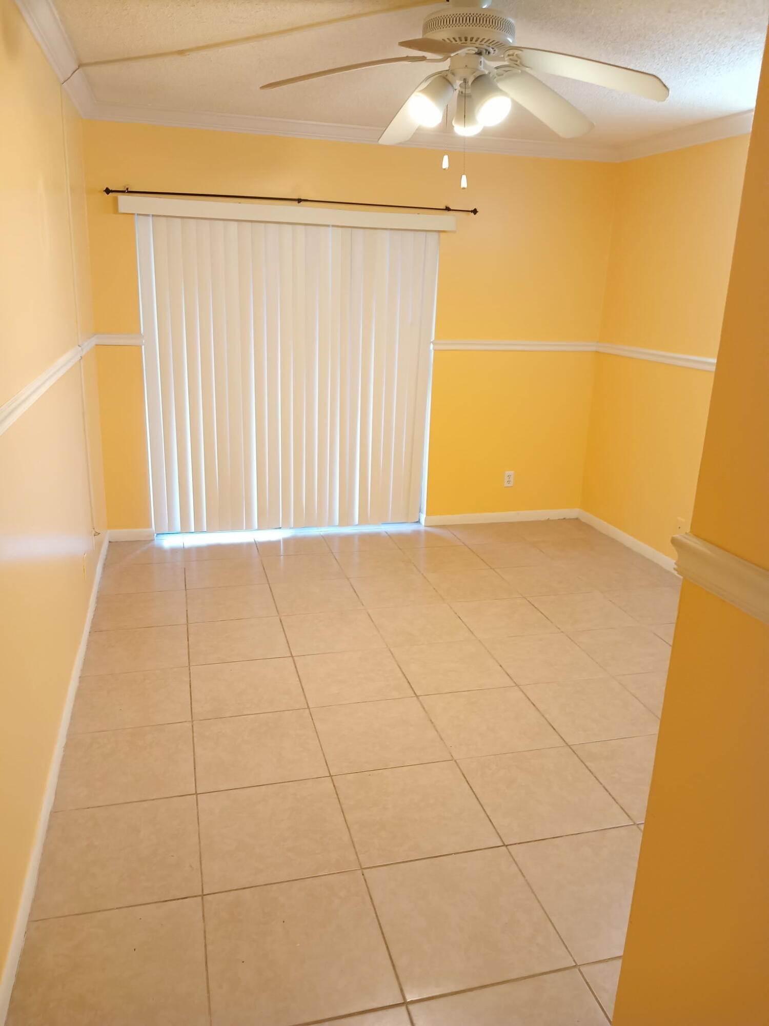 632 Northwest 13th Street, Unit 12 Boca Raton, FL 33486 - Photo 6 of 12 a view of a room with an empty room