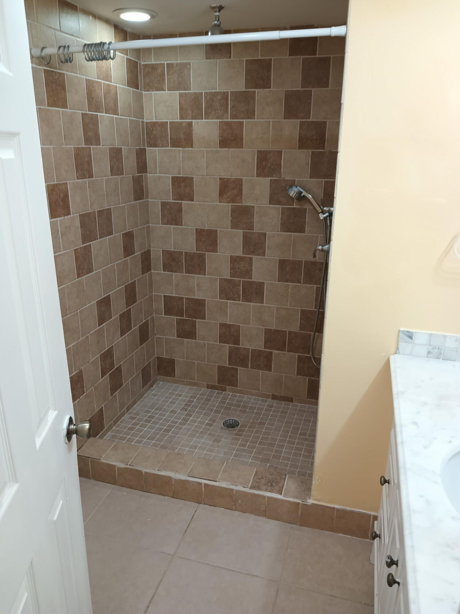 632 Northwest 13th Street, Unit 12 Boca Raton, FL 33486 - Photo 7 of 12 a bathroom with a shower