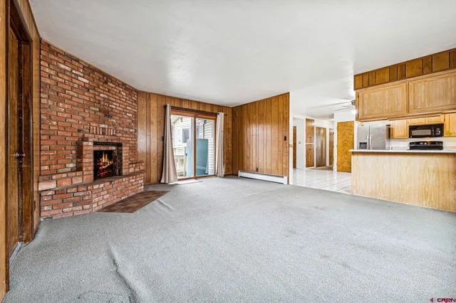 a view of a livingroom with a fireplace