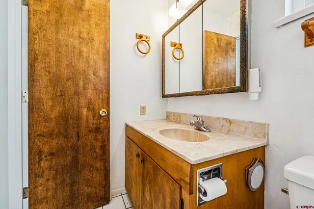 a bathroom with a sink and a toilet