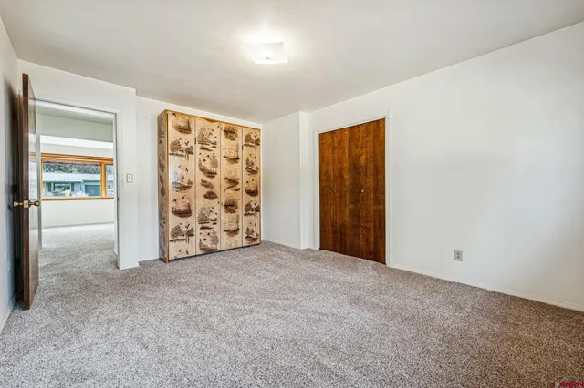 an empty room with closet