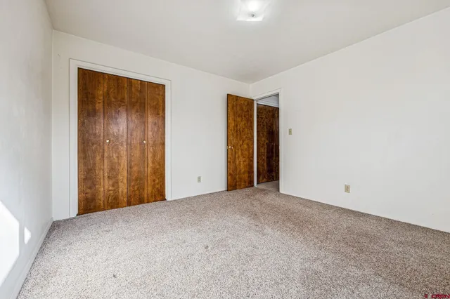 an empty room with closet