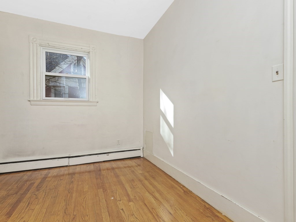 90 Addington Road, Unit 2 Brookline, MA 02445 - Photo 15 of 41 an empty room with a window